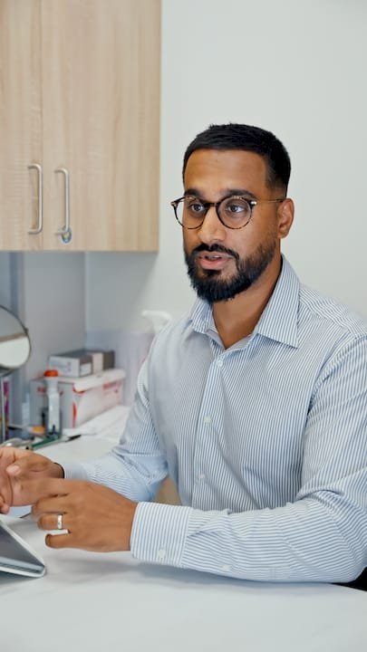 Nutritionist explaining weight loss science in office